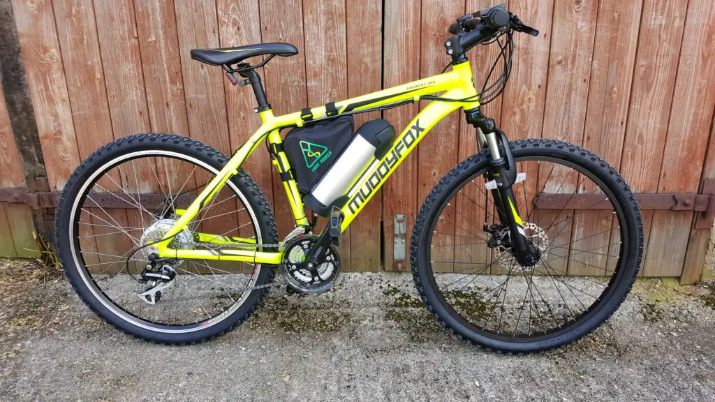 Yellow mountain bike fitted with a 250 watt electric bike conversion kit