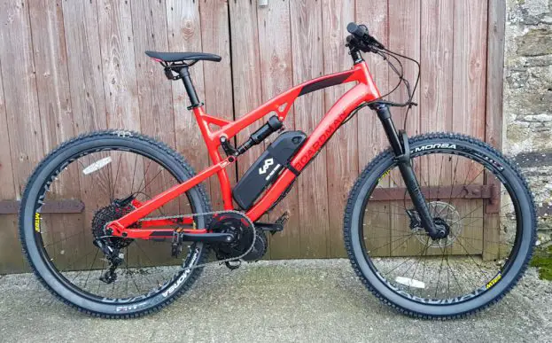 a red boardman mtr 8.9 full suspension mountain bike converted to electric