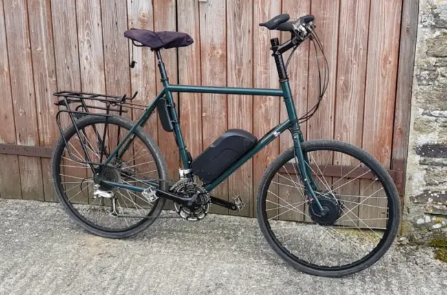 a surly long haul trucker with a front wheel electric conversion